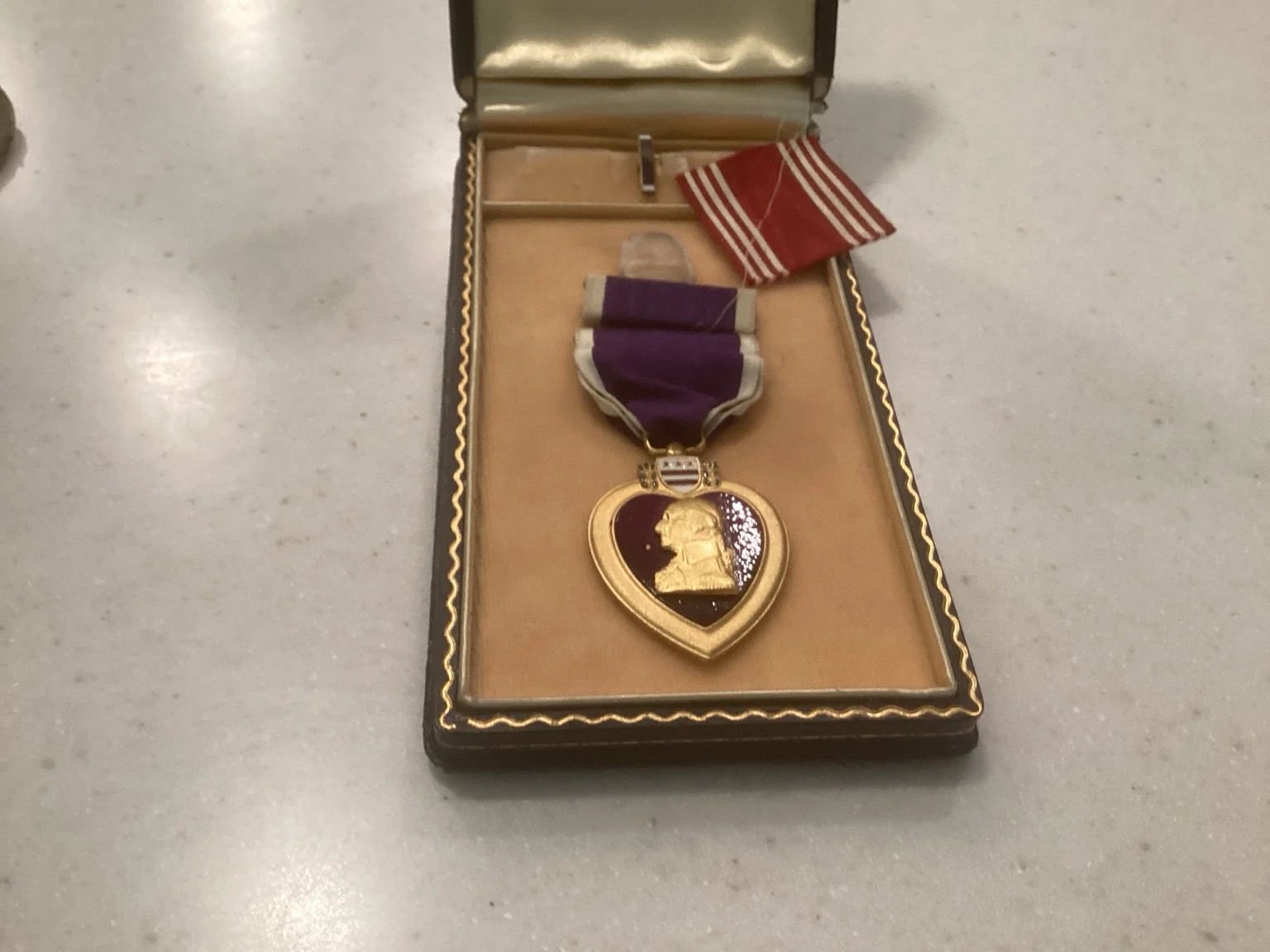 Purple Heart medal in its case